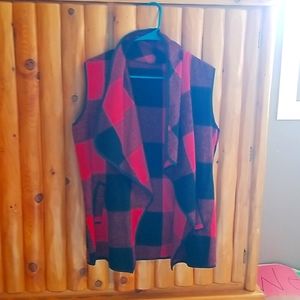 Heavy soft knit plaid vest with pockets. Worn once for family photos.